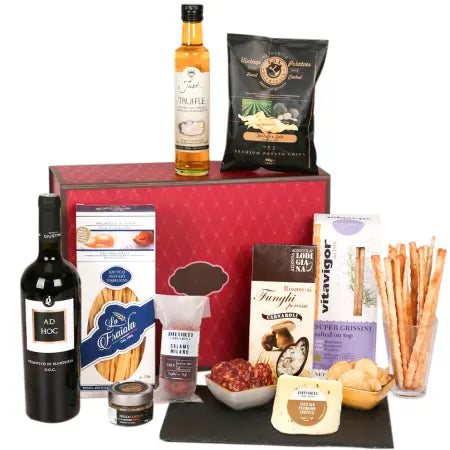 Elegant gourmet hamper with fine wine, truffle delicacies, and olive oil