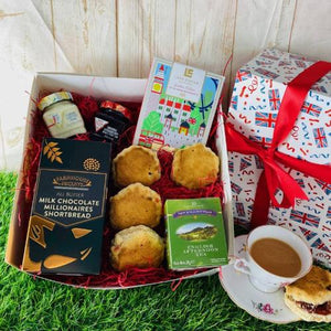 Deluxe tea time hamper with scones, preserves, and premium teas