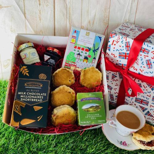 Deluxe tea time hamper with scones, preserves, and premium teas
