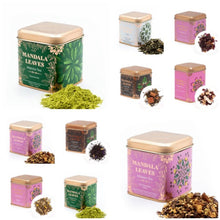 Load image into Gallery viewer, Collection of 'Mandala Leaves' tea tins with various designs and tea leaves displayed. Artisan tea and matcha in decorative tins