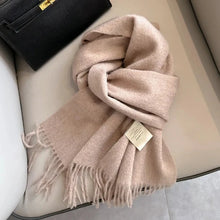 Load image into Gallery viewer, Beige scarf with a tag made from pure wool