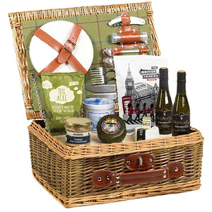 shop-online-picnic-bbq-set-hamper-gift-for-all-occasions-deluxe-bbq-picnic-hamper-sandwich on plate beside brown wicker basket