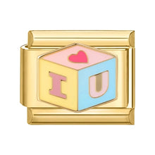 Load image into Gallery viewer, Gold charm with 'I “u' letters and a pink heart bead for modular stainless steel bracelets