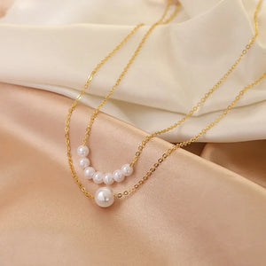Stylish layered pearl necklace close-up