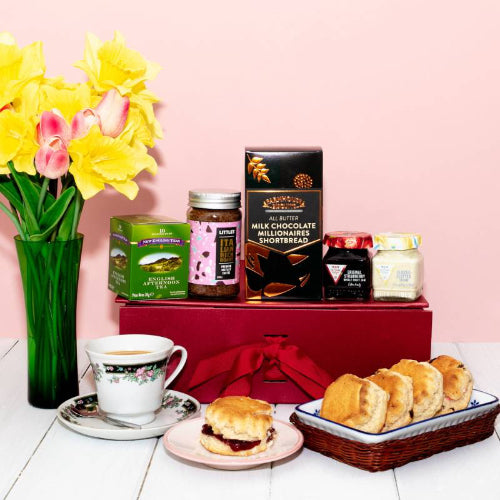 Gourmet afternoon tea gift basket perfect for birthdays or thank-you gifts.