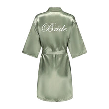 Load image into Gallery viewer,  Bride robe with shiny satin finish and gold lettering