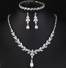 Load image into Gallery viewer, Bridal jewelry set featuring leaf design and sparkling stones
