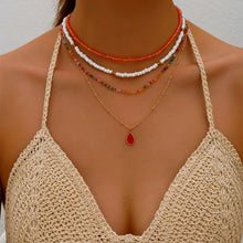 Load image into Gallery viewer,  Crystal and tassel pendant boho necklace