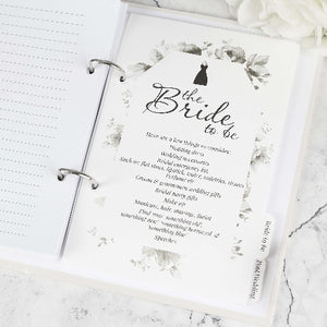 Sheet of paper titled 'The Bride to Be' with wedding preparation checklist. Botanical border wedding planning gift