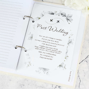 Open book with a post-wedding checklist, Bride wedding planner book with flowers