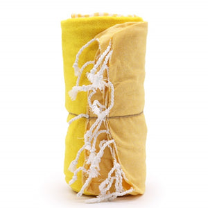 Cotton beach towel used as a wraparound cover-up