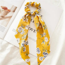 Load image into Gallery viewer, Yellow floral headband scarf tied into a bow 