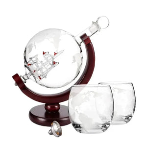 Whiskey decanter with etched globe design and stand