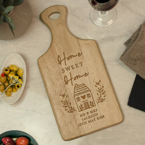 Engraved wooden chopping board with Home Sweet Home design