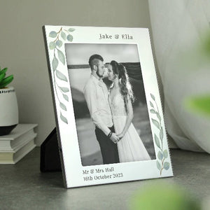 Custom engraved silver photo frame with botanical design