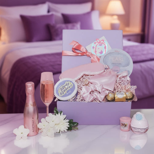 Pamper hamper for her with rose Prosecco, silky body butter, and candles