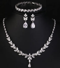 Load image into Gallery viewer, Luxury women’s CZ jewelry set with earrings and bracelet