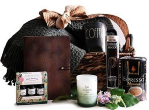 Cozy men’s gift set featuring hot chocolate, soft blanket, and mug
