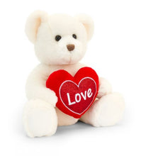 Load image into Gallery viewer, Cute brown teddy bear plush holding a love heart cushion