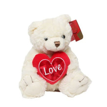 Load image into Gallery viewer, Cream teddy bear holding a heart for Valentine’s Day present