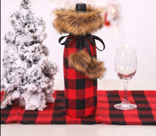 Load image into Gallery viewer, Festive Santa suit cover for red wine bottles