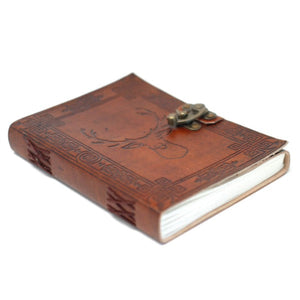 Handmade leather diary with strap closure and paper