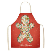 Load image into Gallery viewer, Merry Christmas apron worn during holiday meals