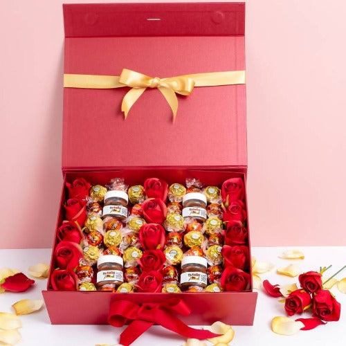 Luxury gift box with Lindt, Ferrero Rocher chocolates, Nutella, and silk roses