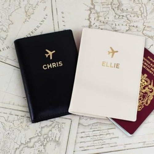 Personalised couple passport holders with matching luggage tags