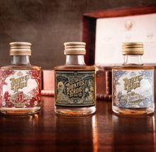Load image into Gallery viewer, Pirate’s Grog miniature rum gift set with three bottles in box
