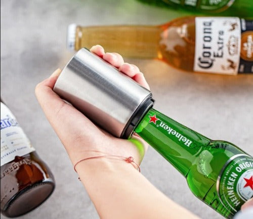 Easy push down beer opener with magnetic cap catcher