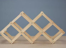 Load image into Gallery viewer, Collapsible wine stand made from durable natural wood
