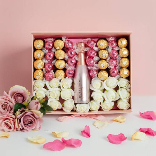 Pink Prosecco, Ferrero Rocher, Roses & Lindor Lindt Strawberry and Cream Chocolates-the chocolate bouquet company-lindor chocolate bouquet uk-ferrero rocher and lindt bouquet-flowers and lindt chocolate delivery-roses and lindt chocolate-lindor chocolate tesco