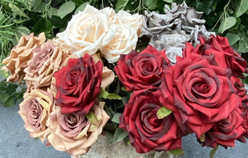 Luxury faux silk roses with sparkling diamond accents.