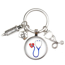 Load image into Gallery viewer, Key Ring New Fashion Personalized Nurse Medical Syringe Stethoscope Image Keychain Glass