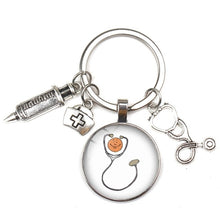 Load image into Gallery viewer, Key Ring New Fashion Personalized Nurse Medical Syringe Stethoscope Image Keychain Glass 